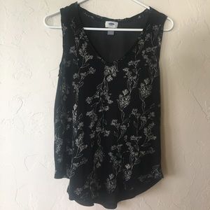Black sleeveless shirt with cream flower print